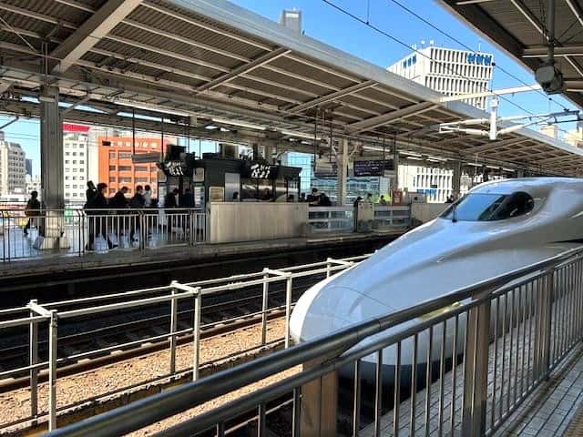 Shinkansen Arriving at Station